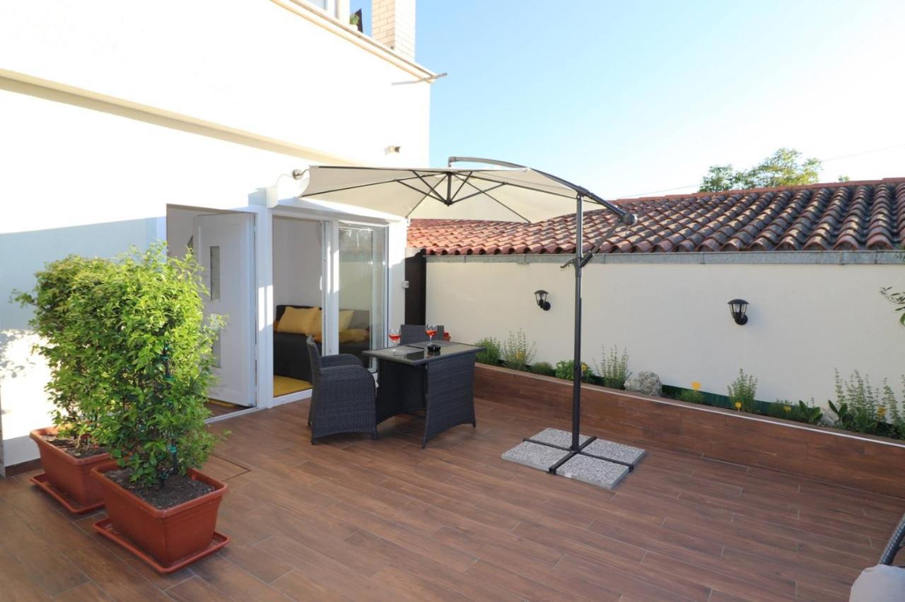 Gostinjska kuća Sain With Garden Terrace Near The